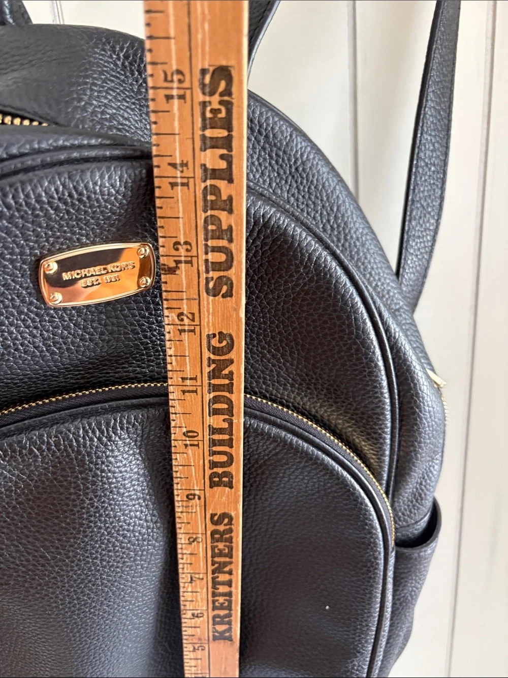 Michael Kors Black Pebbled Leather Small Backpack with Gold Plaque